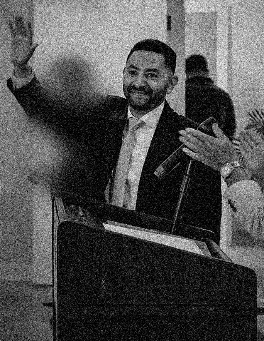 Ricardo Valencia at a podium